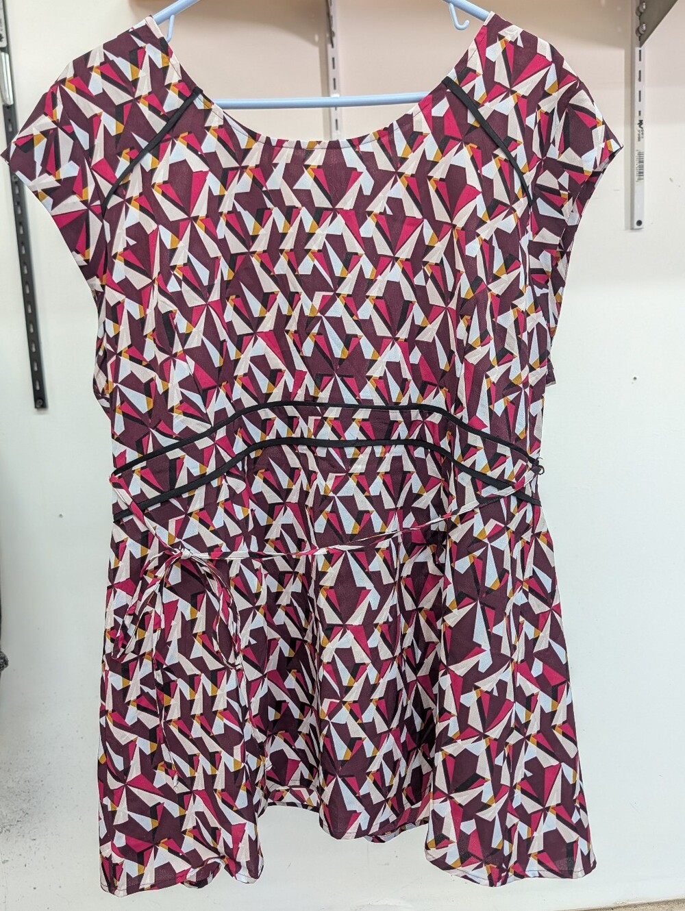 Motherhood Geometric Peplum Top in Maroon, Pink and White